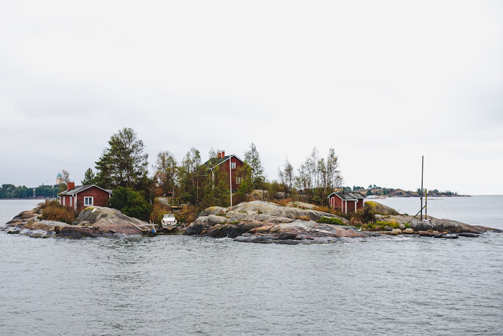 a small island with a red house