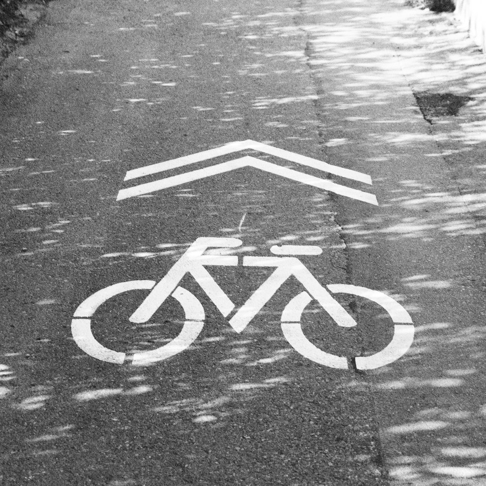 a bicycle symbol painted on the road