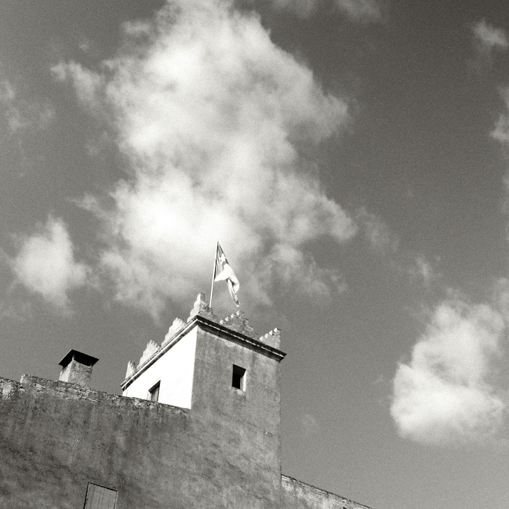 a building with a flag on top