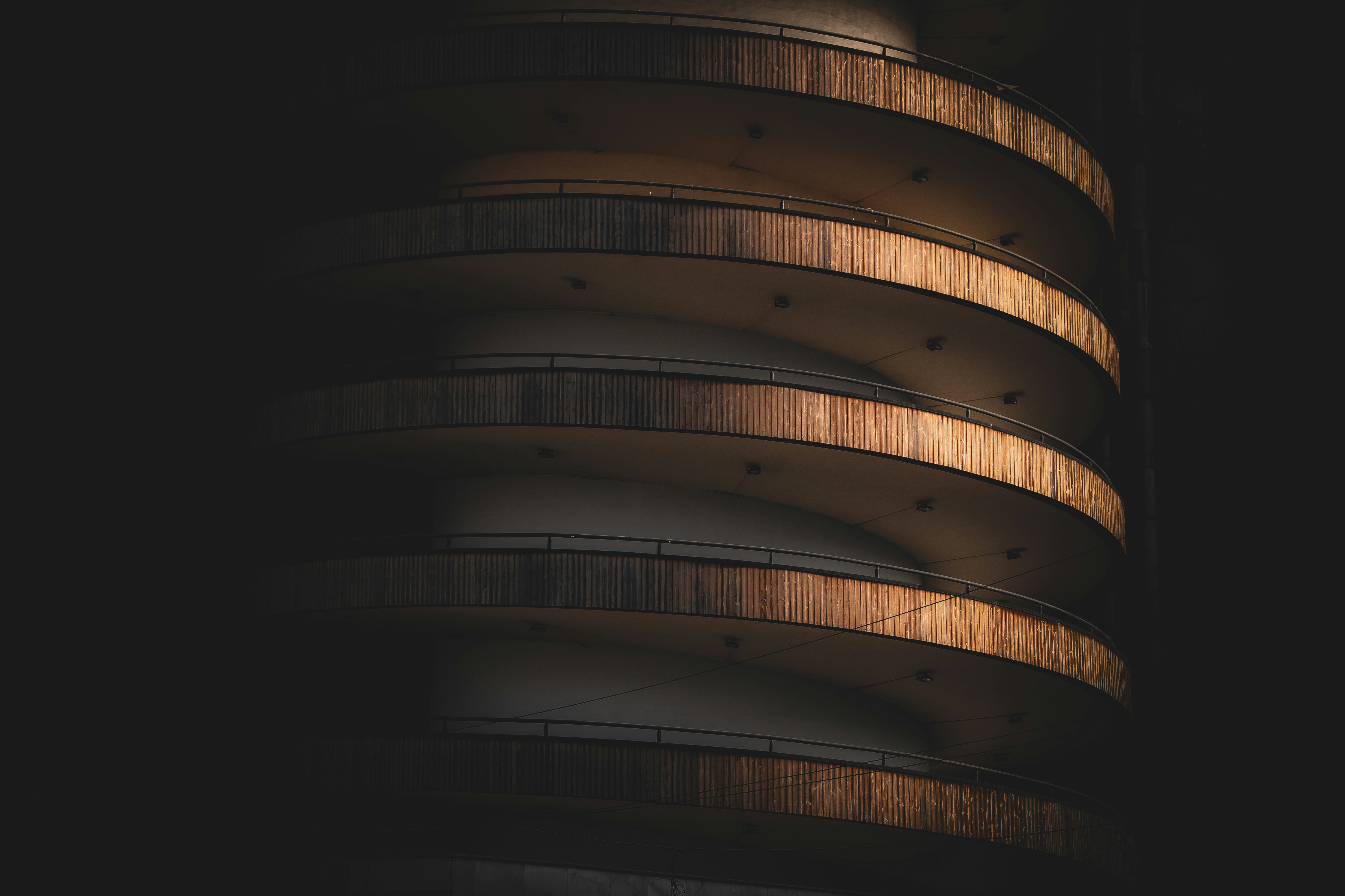 A spiral staircase with a dark background photo – Free Tehran province