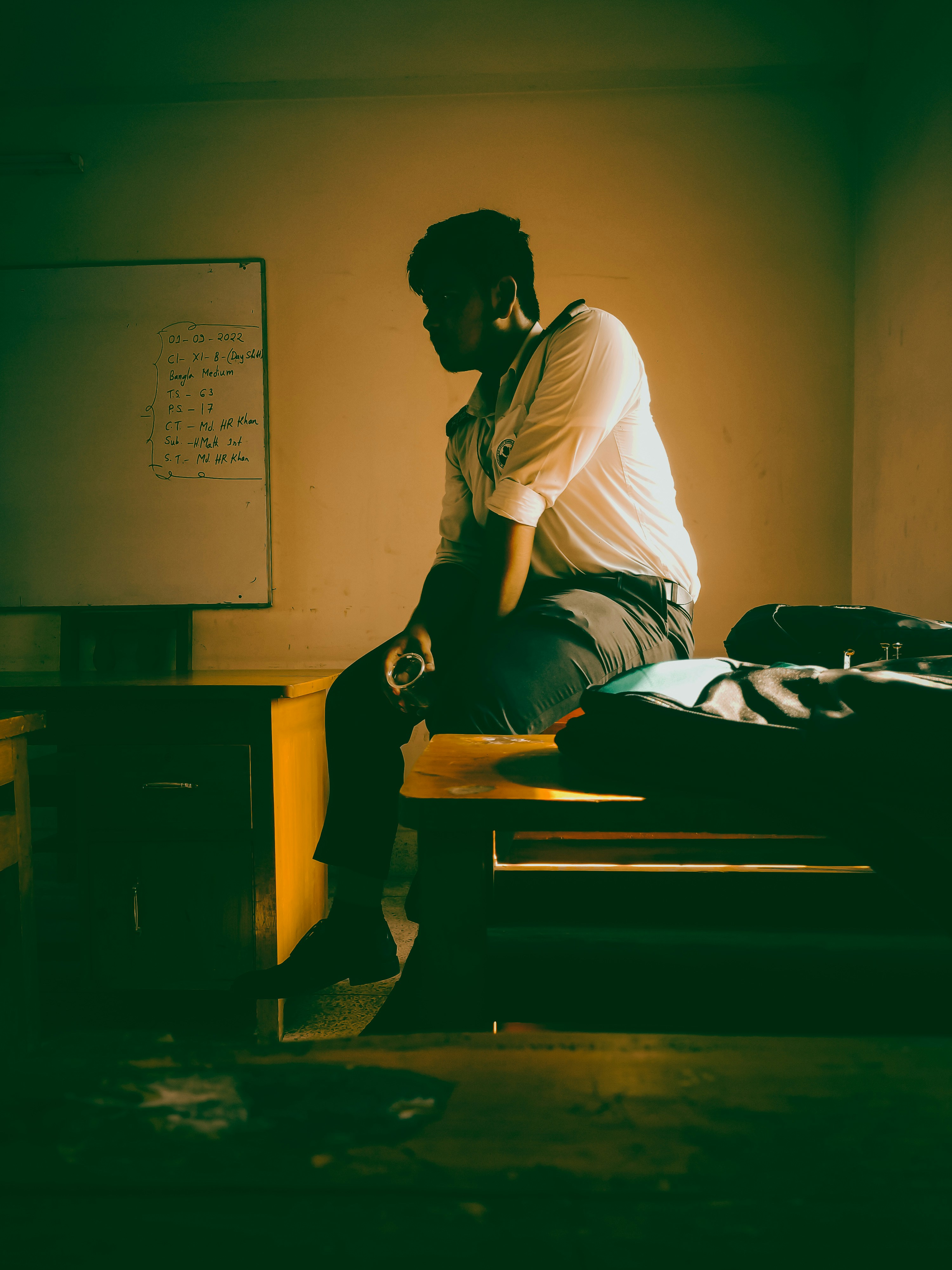 a person sitting on a bed