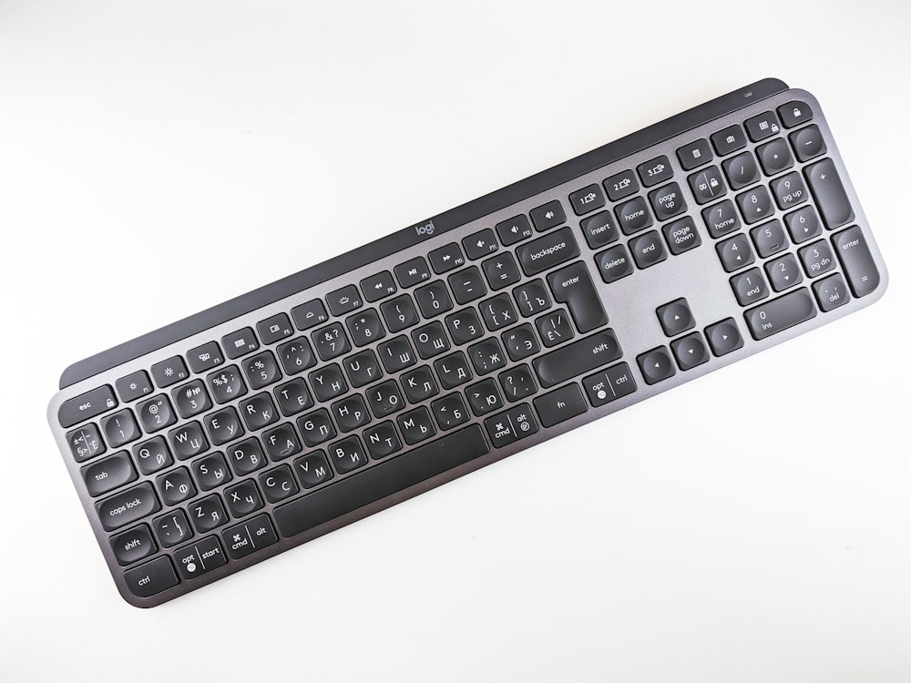a black keyboard with a white background