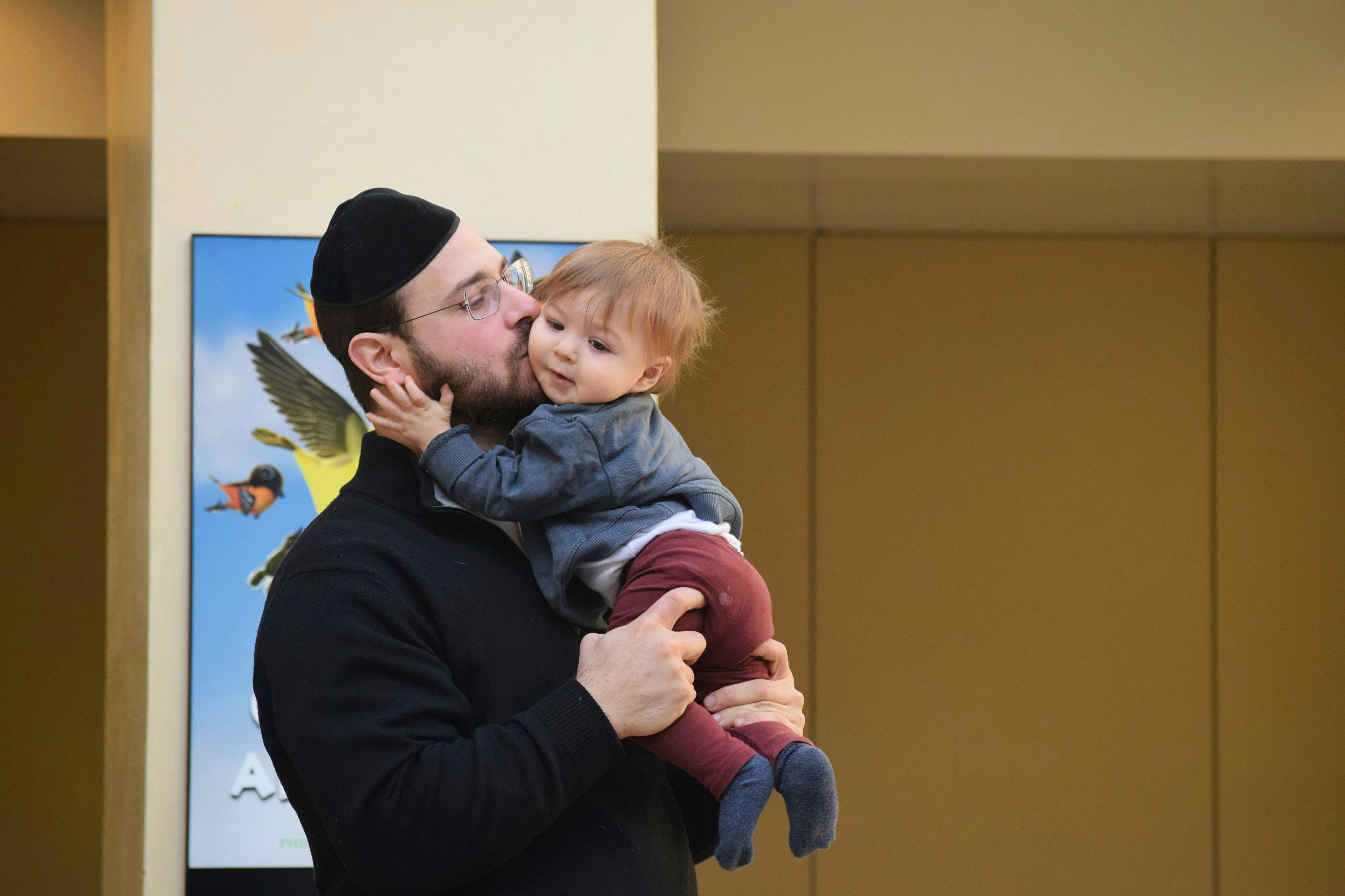 a person holding a baby