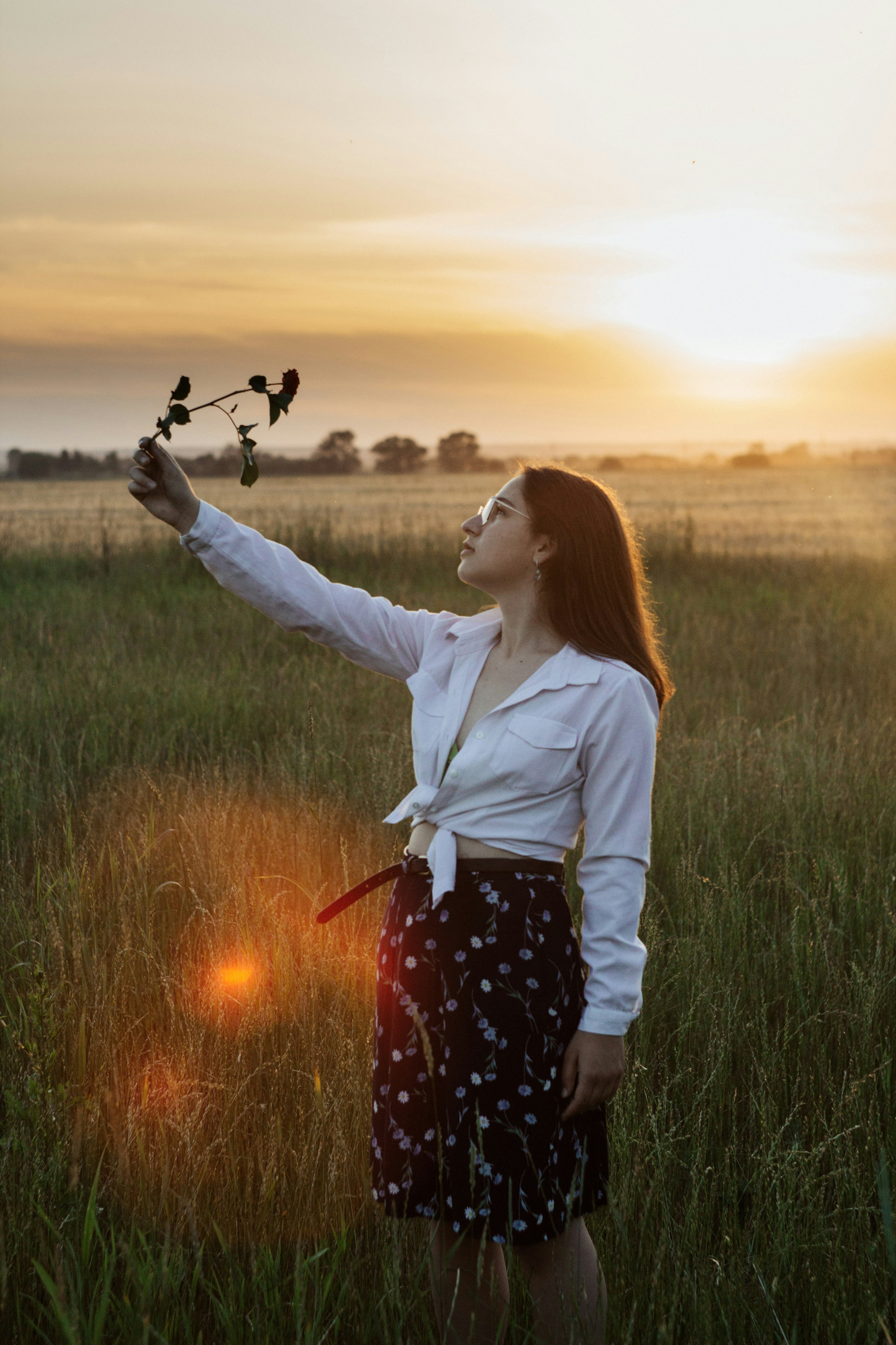 a person holding a butterfly