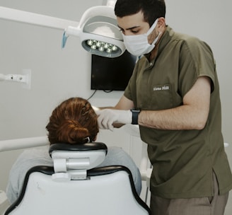 a dentist examining a patient