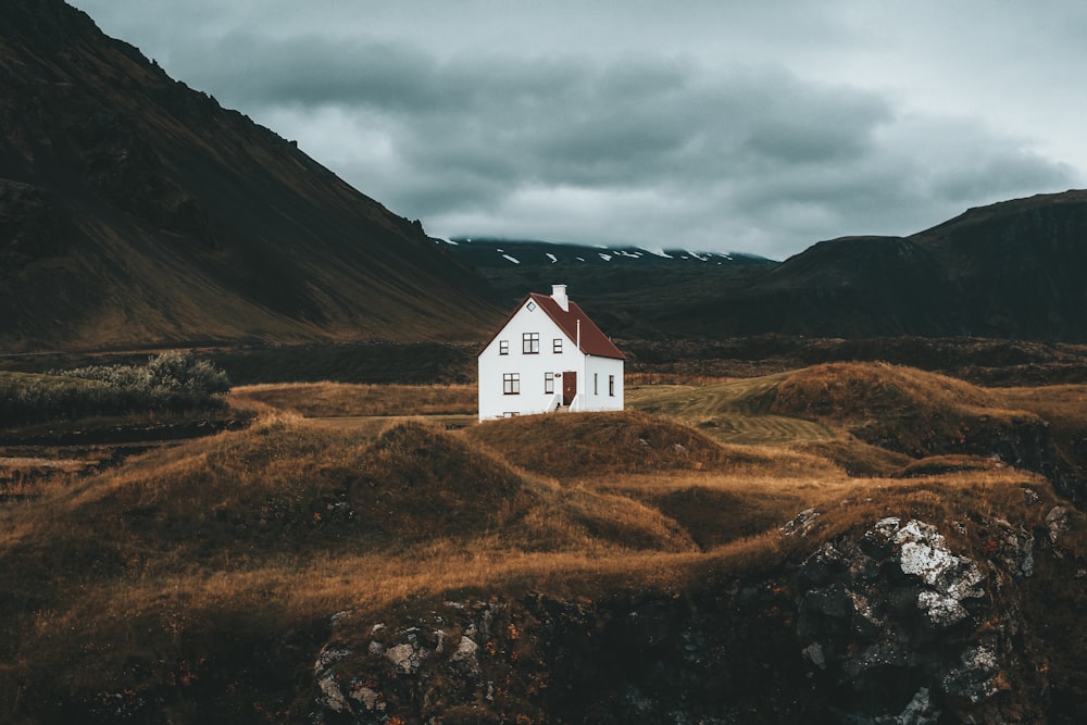 a white house in a valley