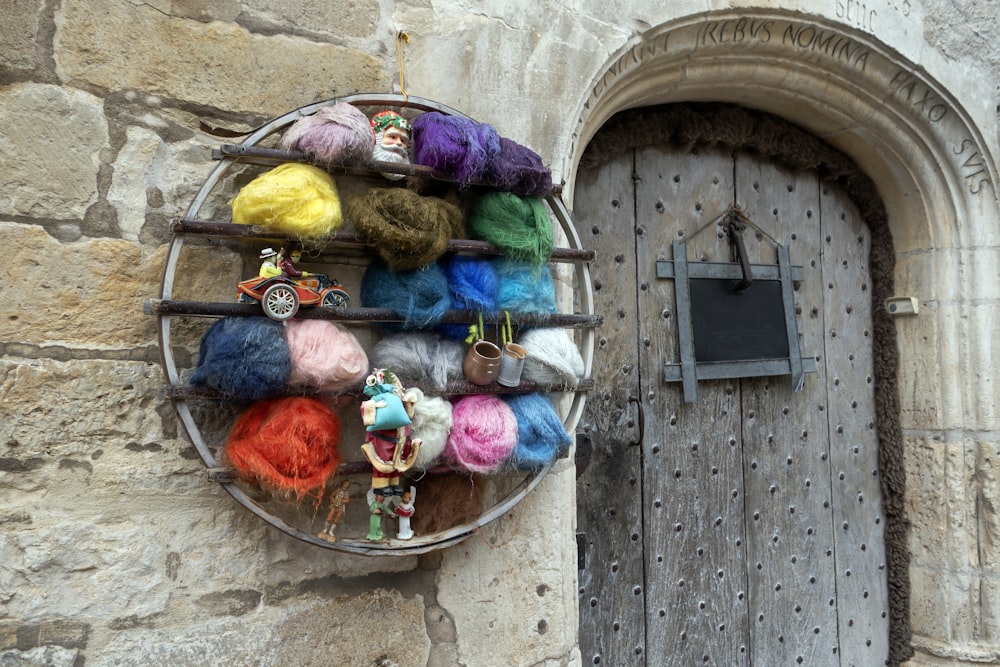 a group of people in clothing outside a door