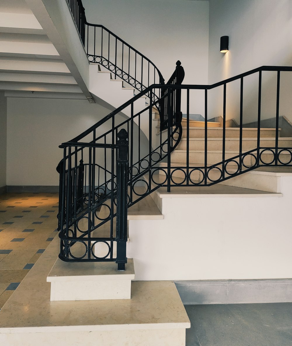 a staircase with black railings