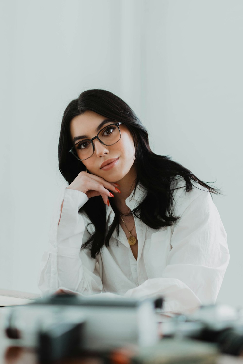 a woman wearing glasses