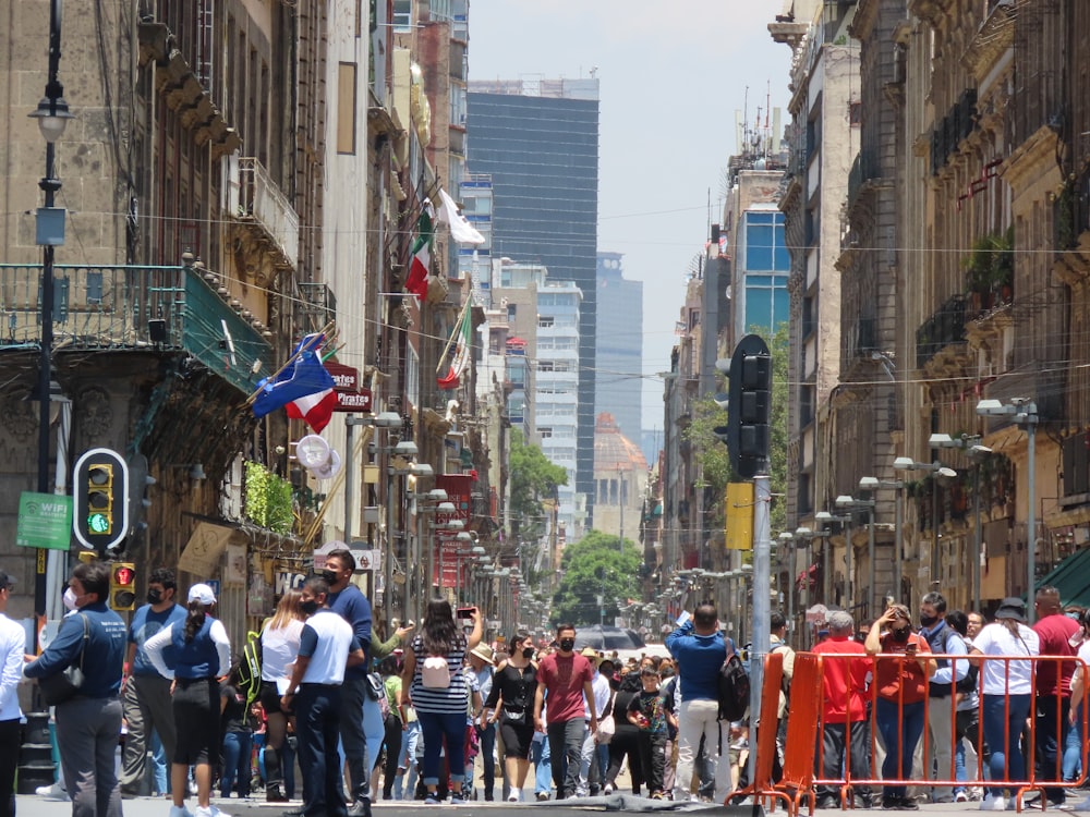 a crowd of people on a busy street