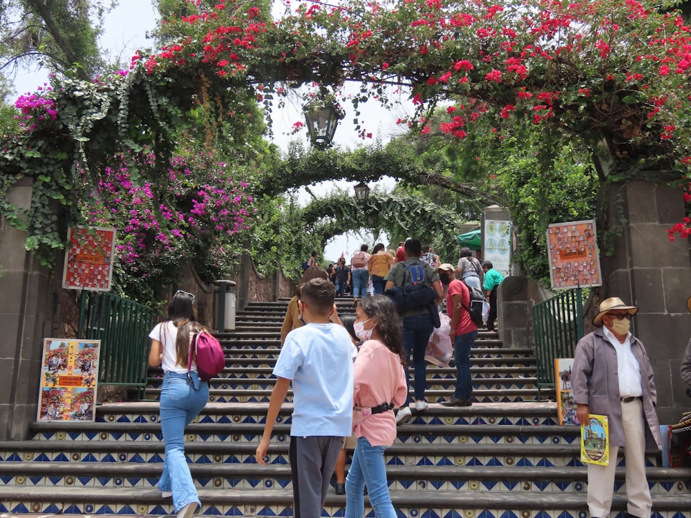 people walking on a sidewalk