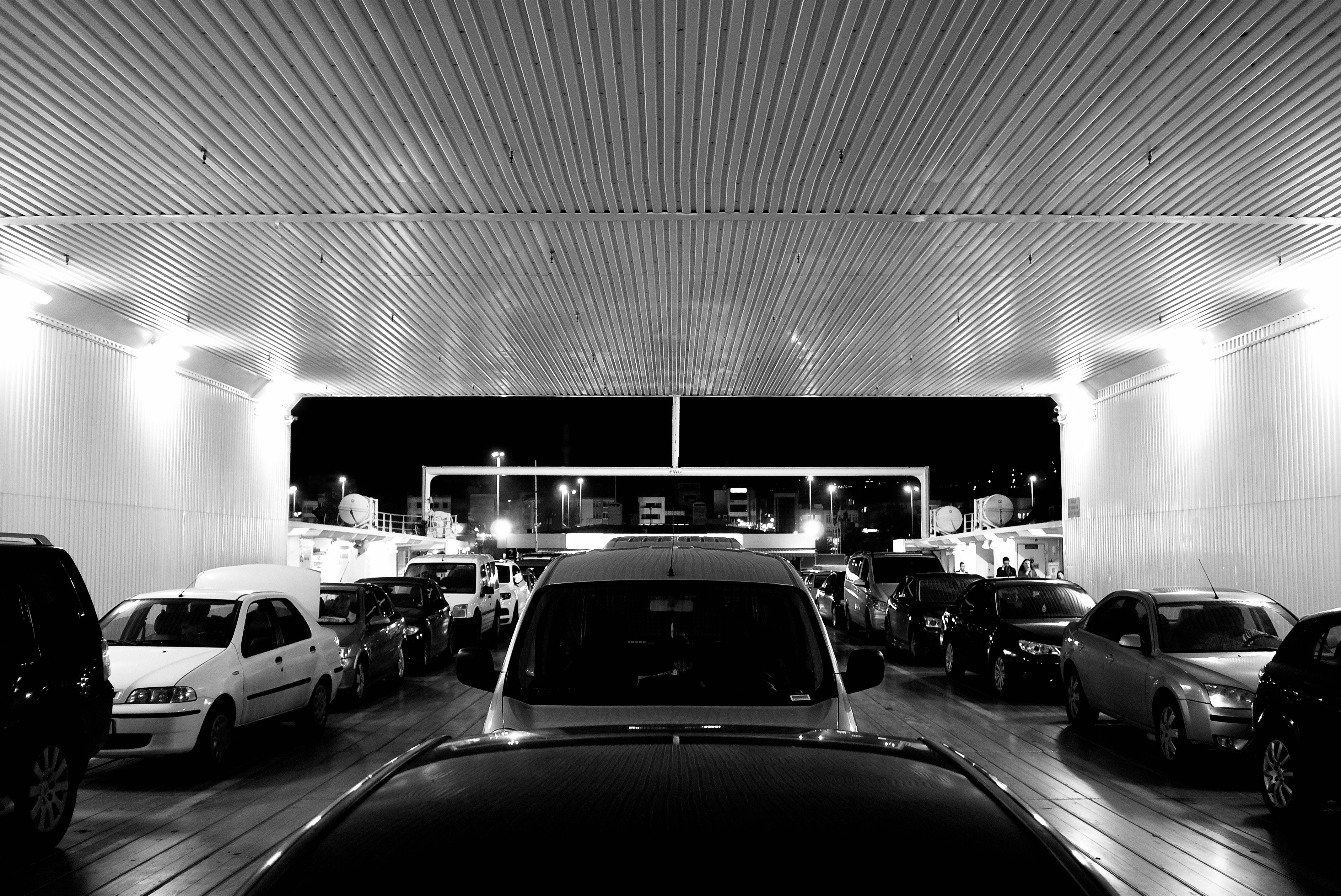 a parking garage full of cars, 