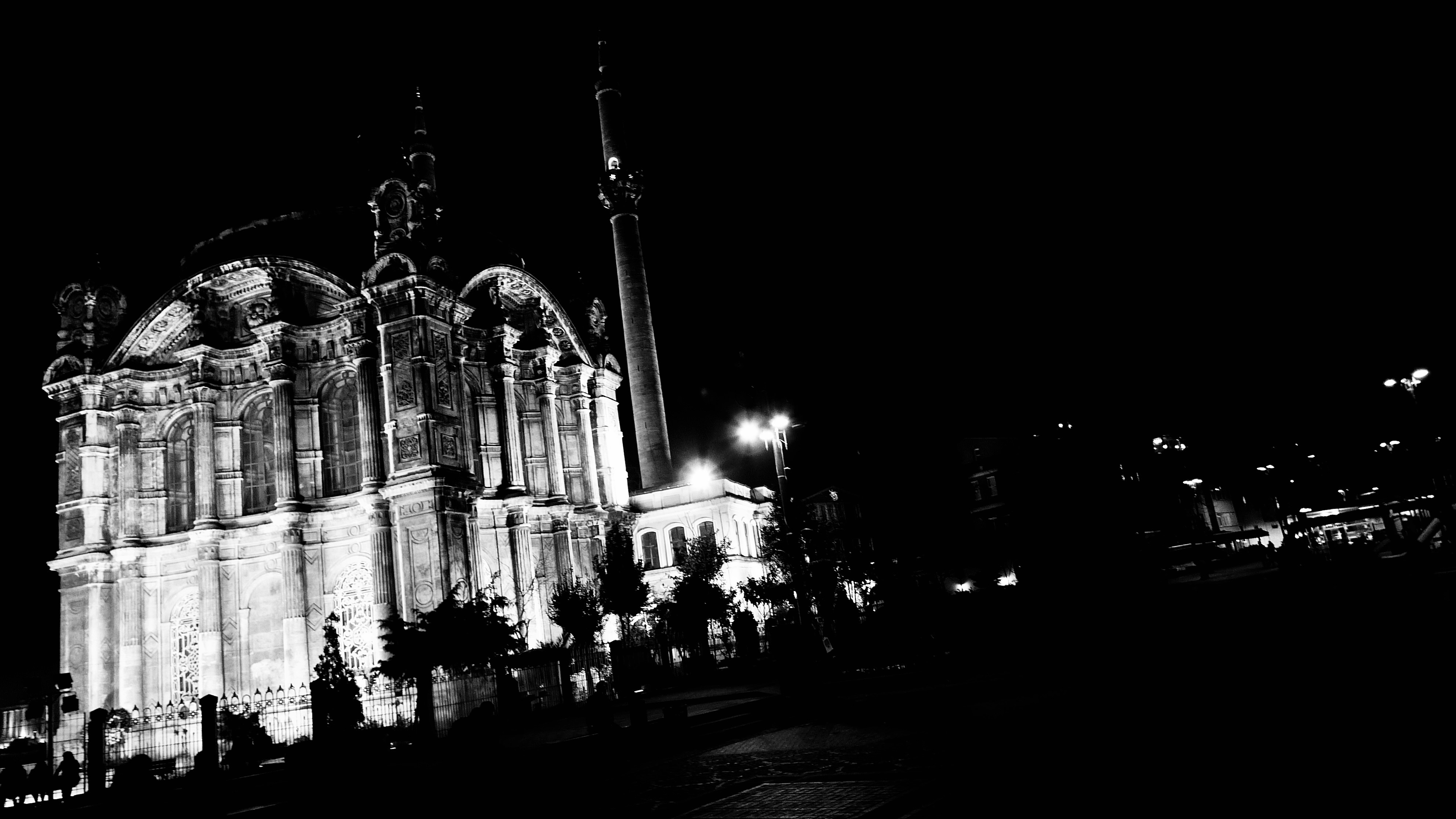 a large building with a tower at night