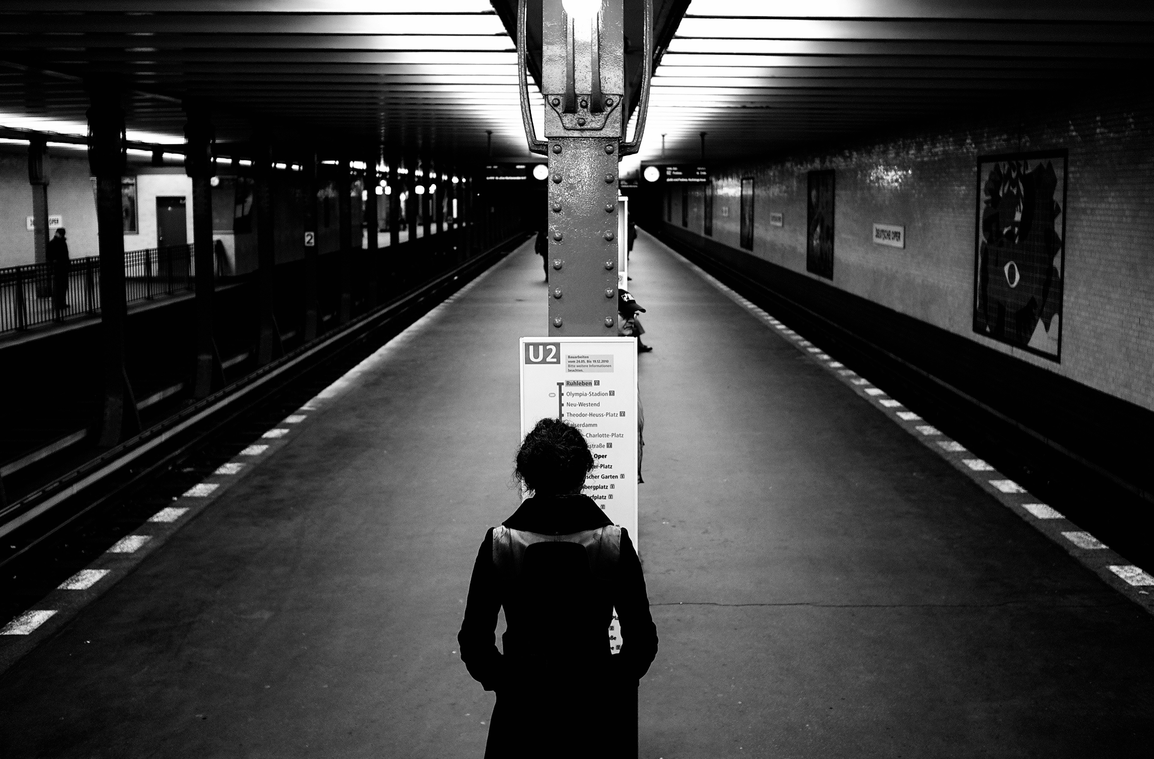 a person standing in a train station