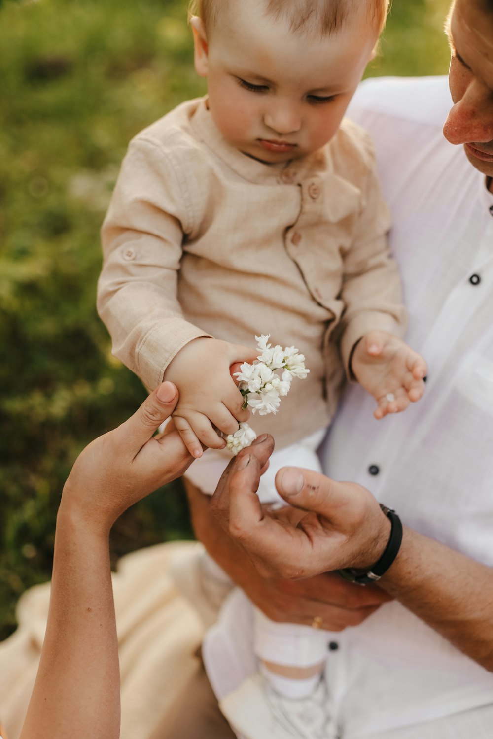 a person holding a baby