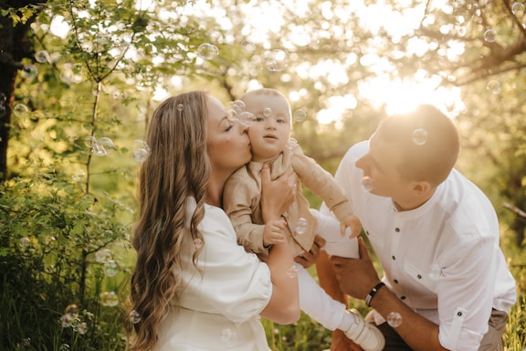 a person holding a baby