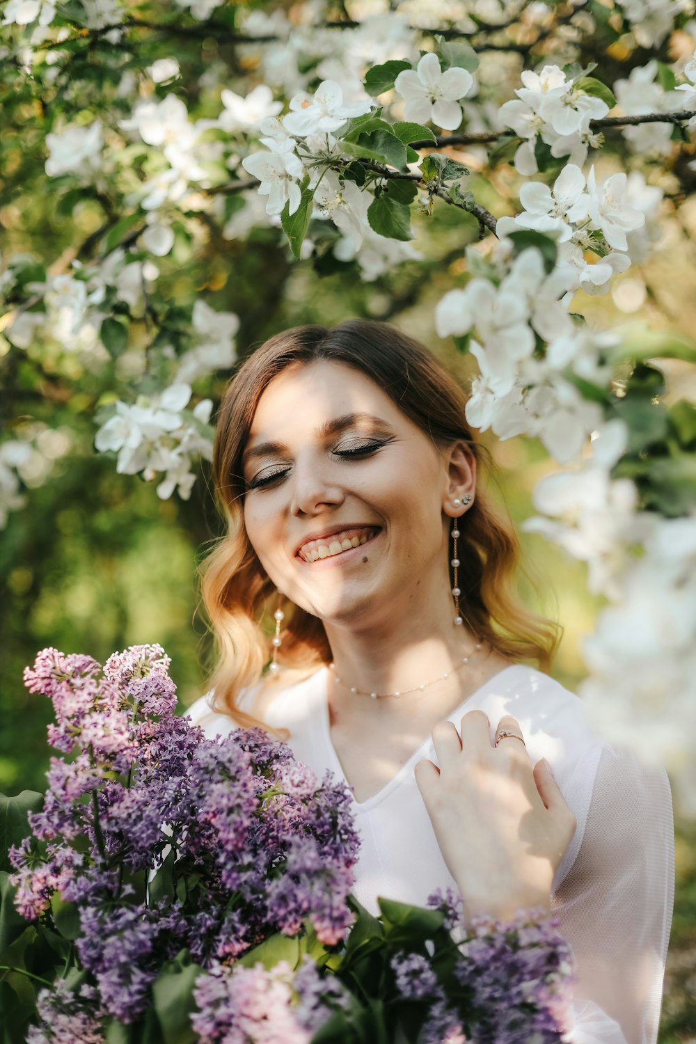 a woman holding flowers