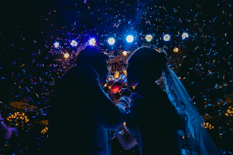 a couple of people kissing