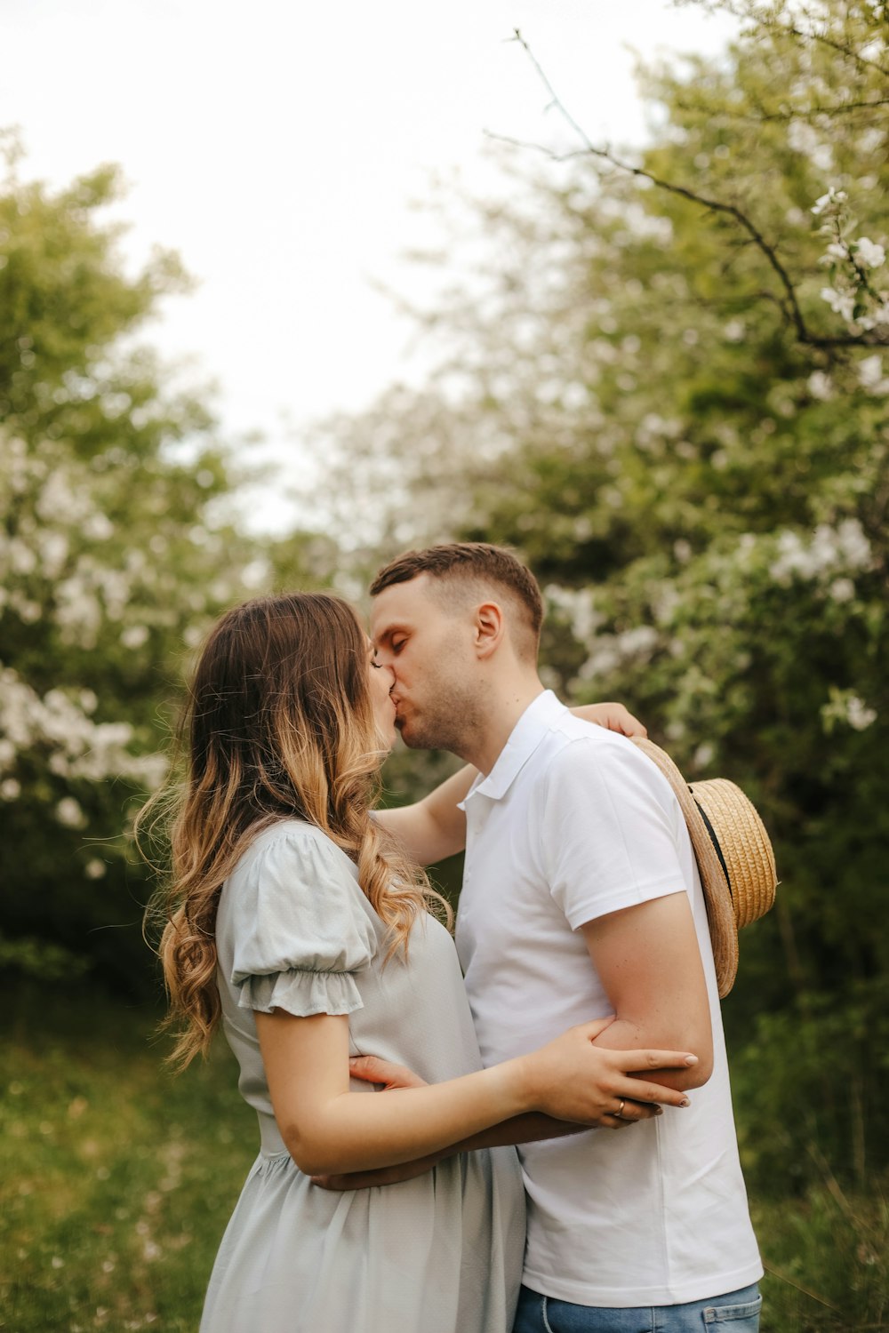 a man and woman kissing