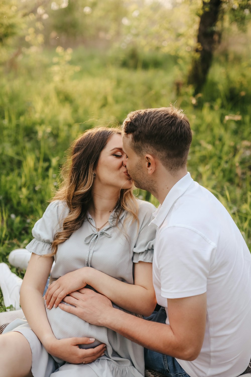 a man and woman kissing