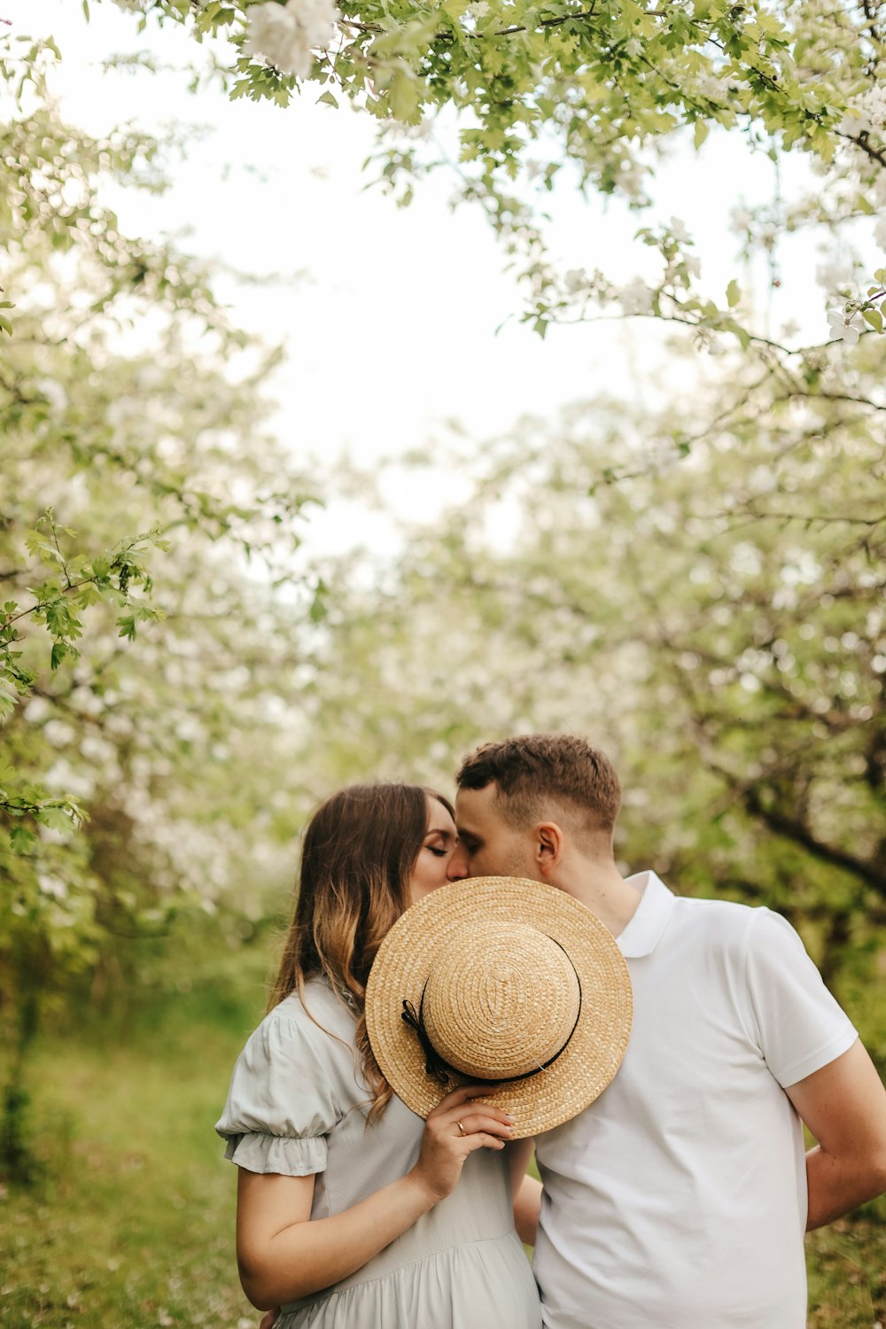 a man and woman kissing