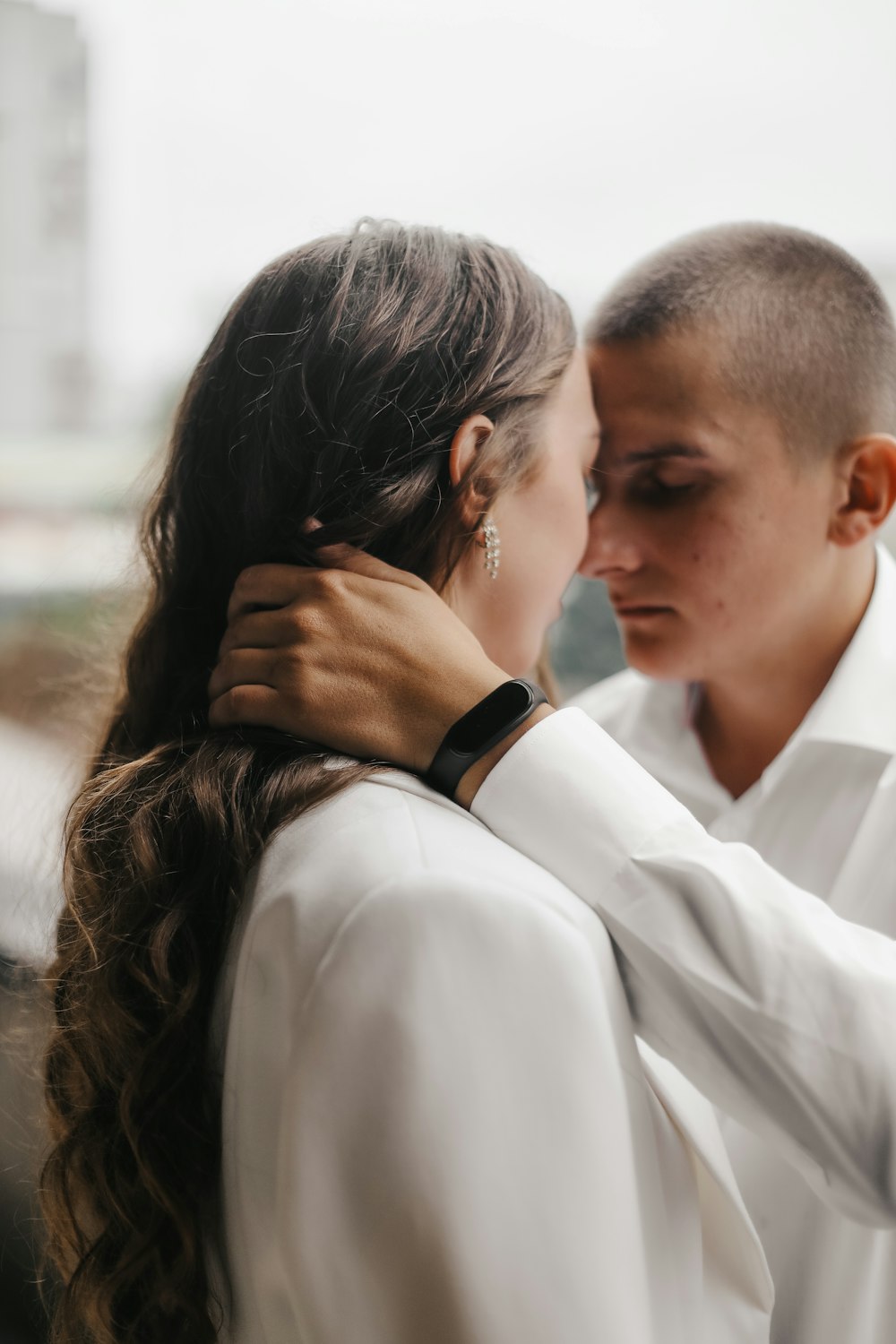 a man and woman kissing