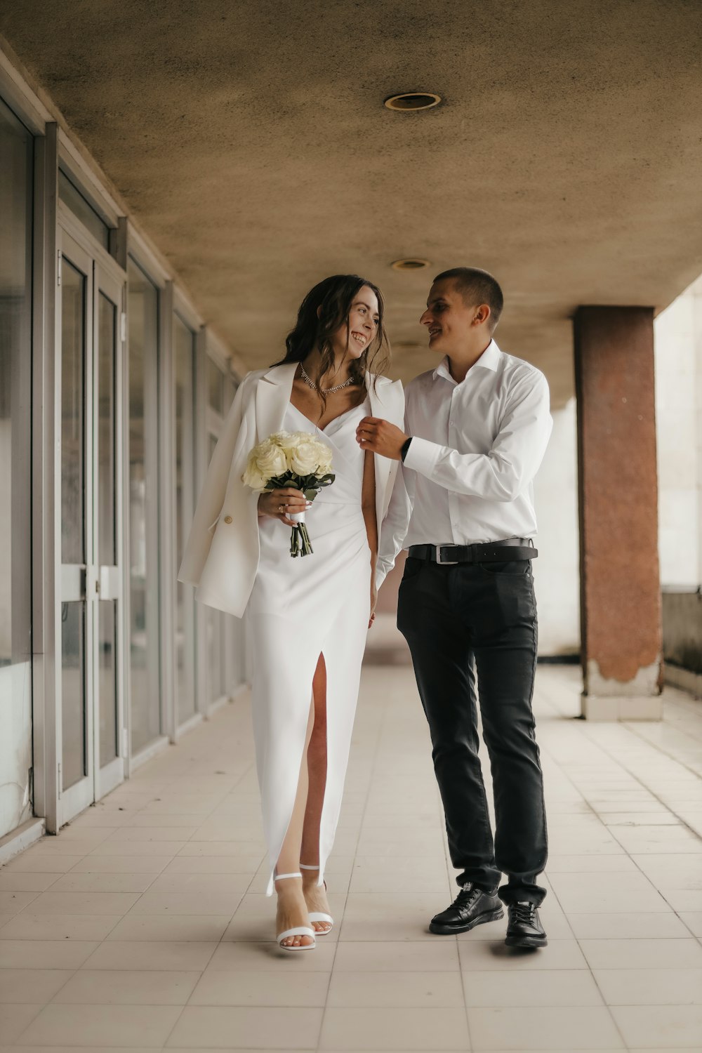 a man and woman holding hands