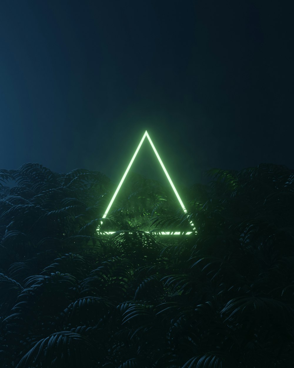 Una pirámide con luces por la noche