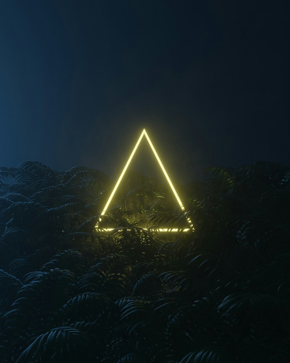 a large pyramid with lights at night