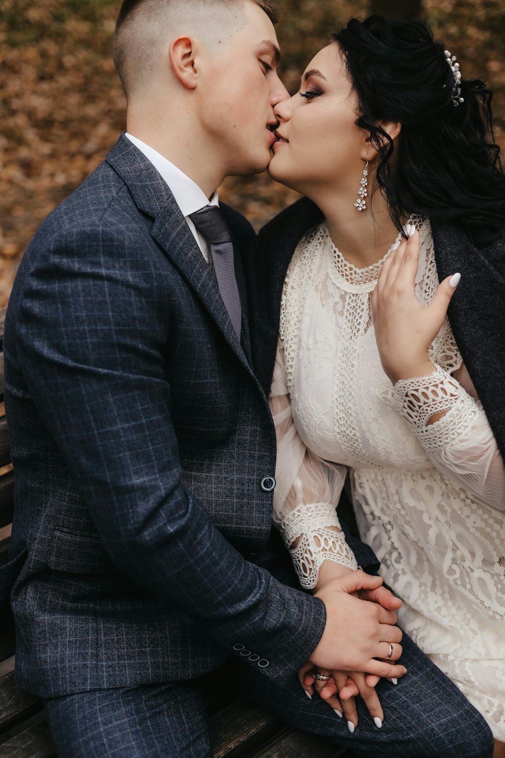 a man and woman kissing