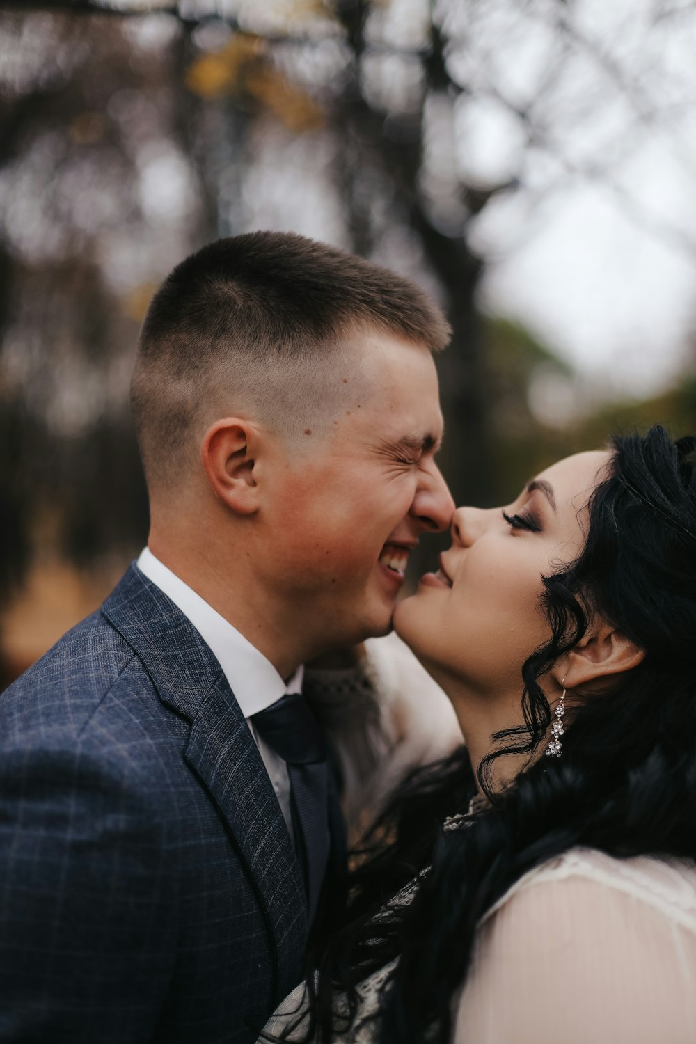 a man and woman kissing