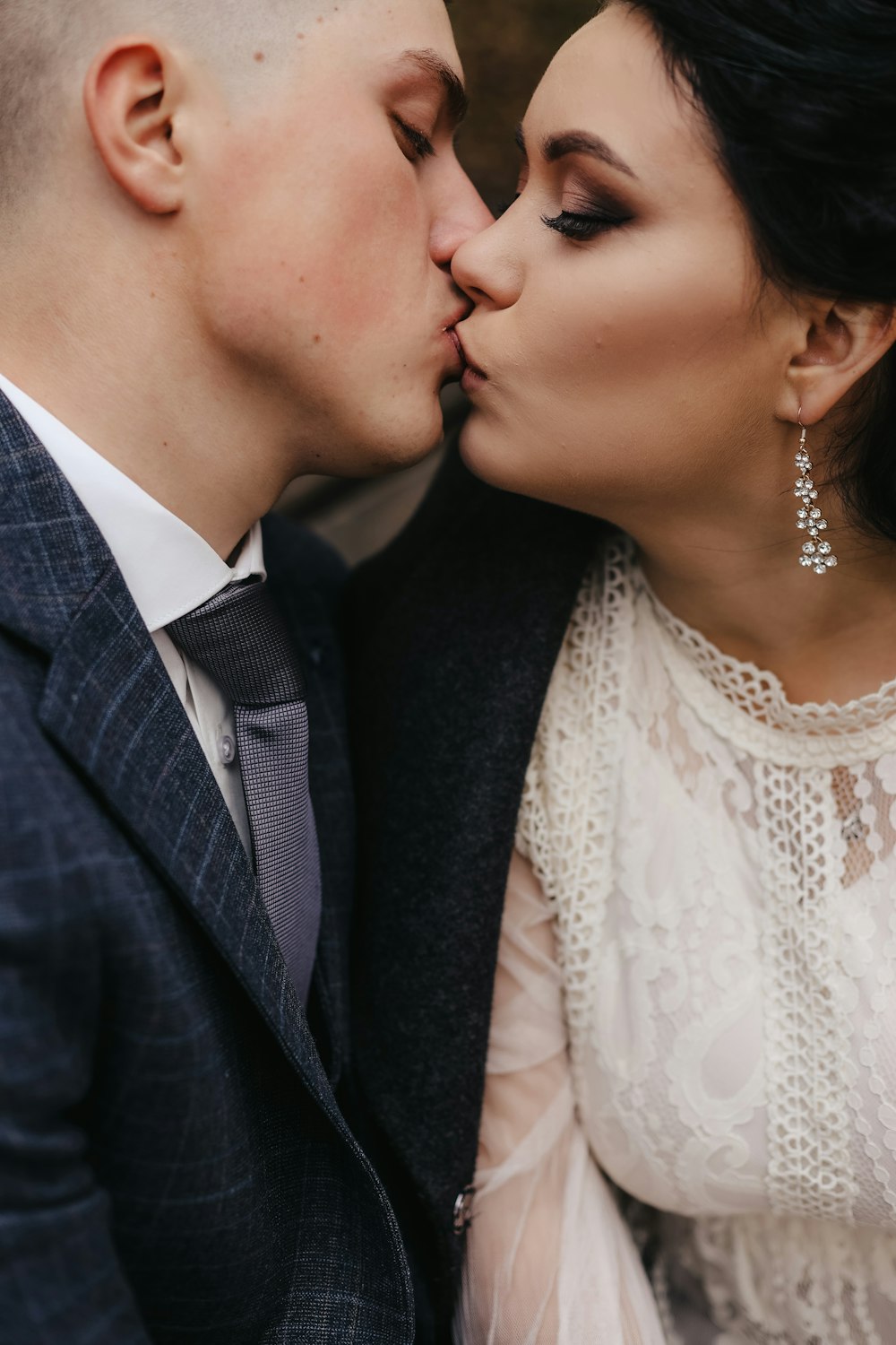 a man and woman kissing