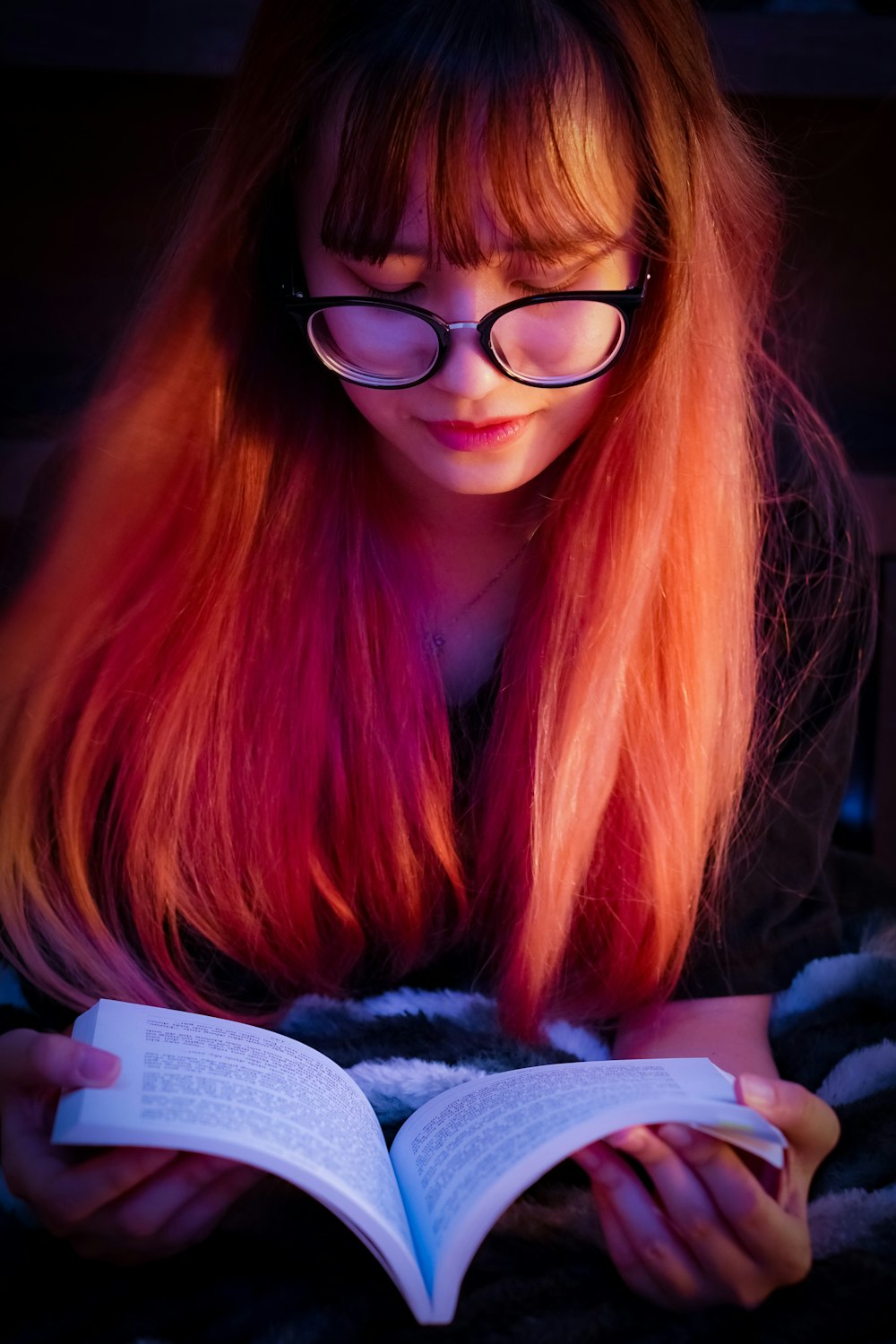 a woman reading a book