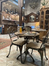 Cozy dining setup in a rustic room with warm lighting at Ovo Oudendijk.