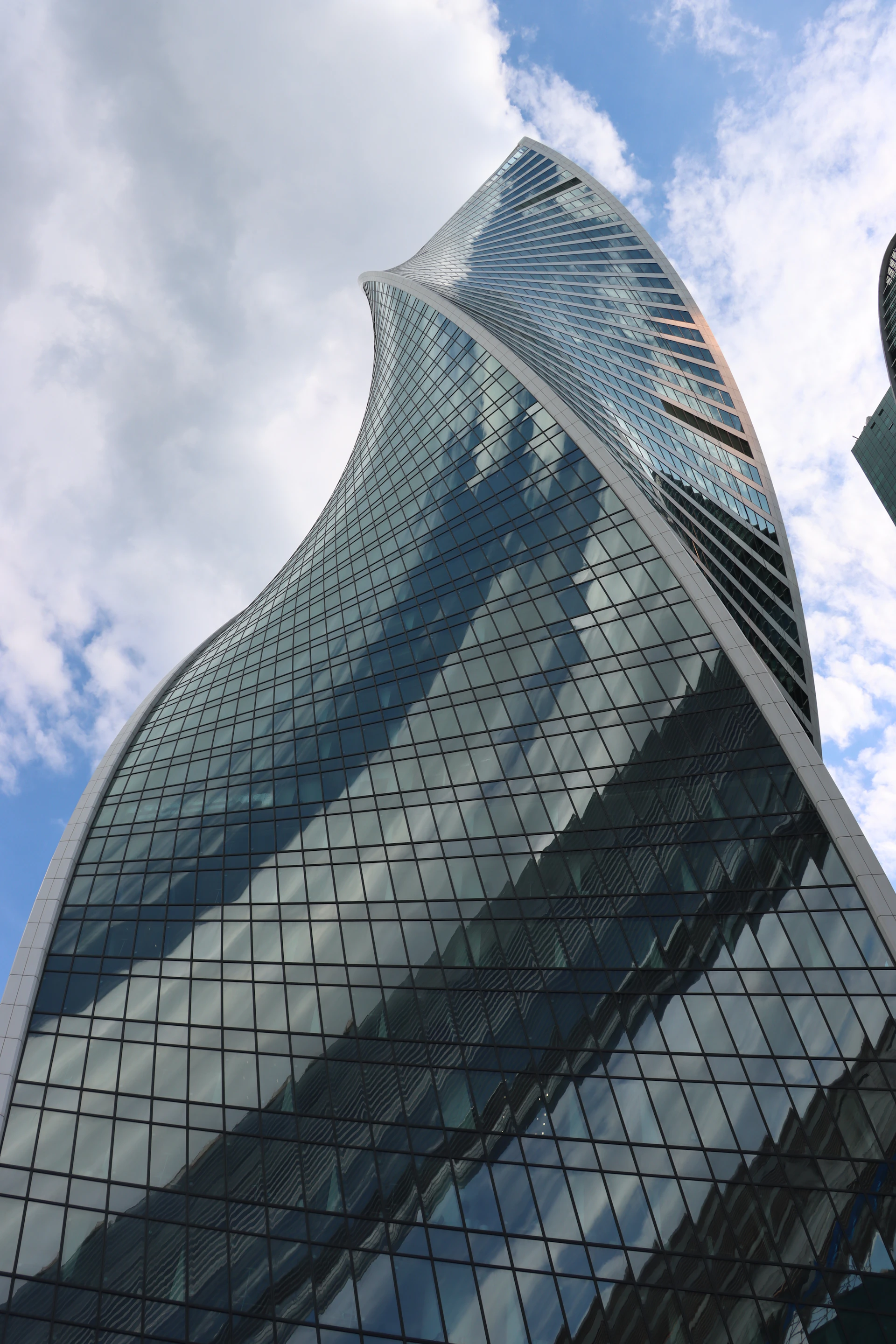 a tall building with glass windows