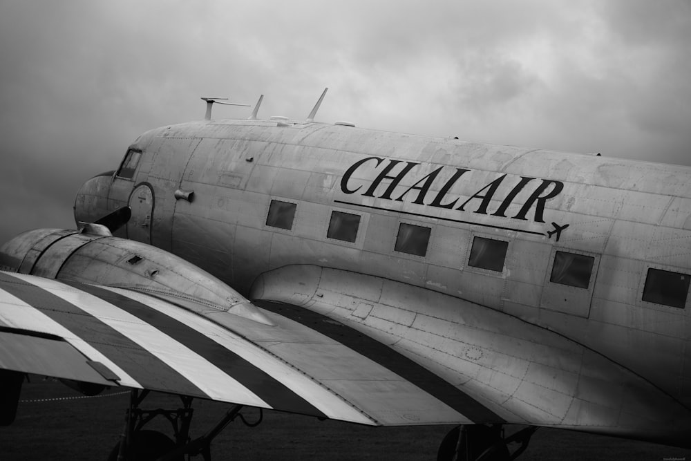 an old airplane is parked