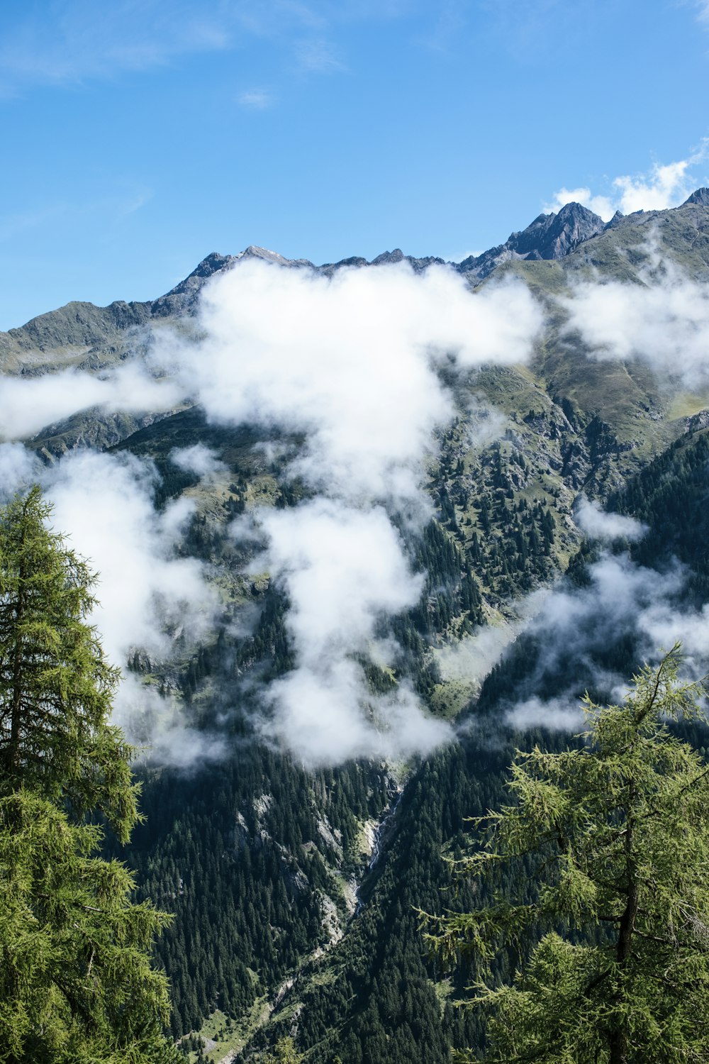 a mountain with clouds