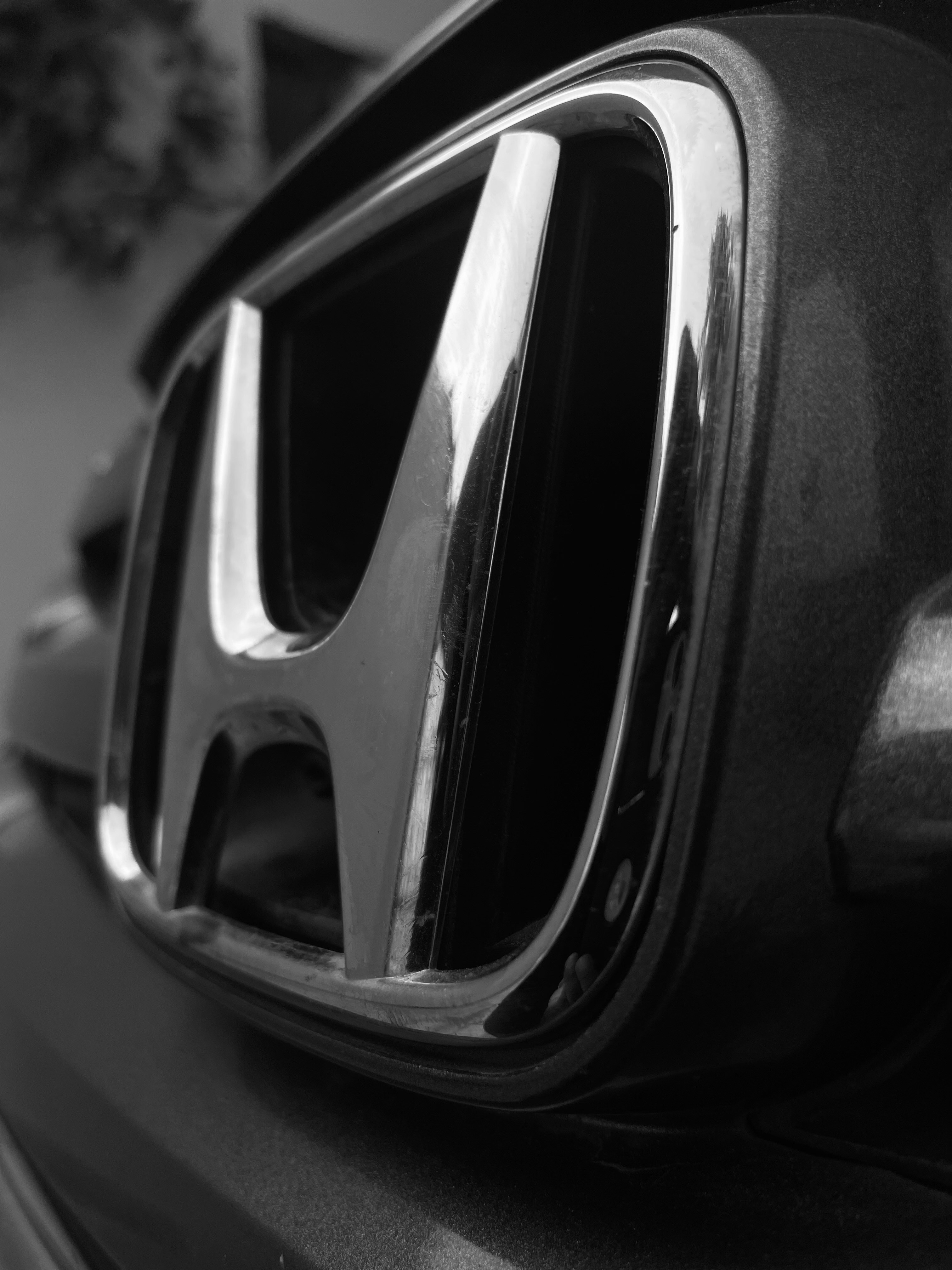 a close up of a car's headlight