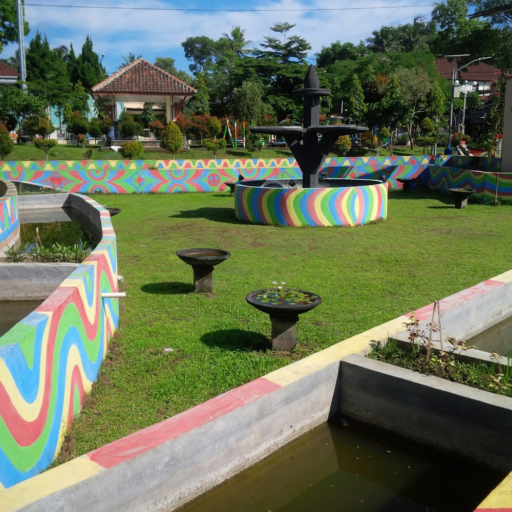 a water fountain in a park