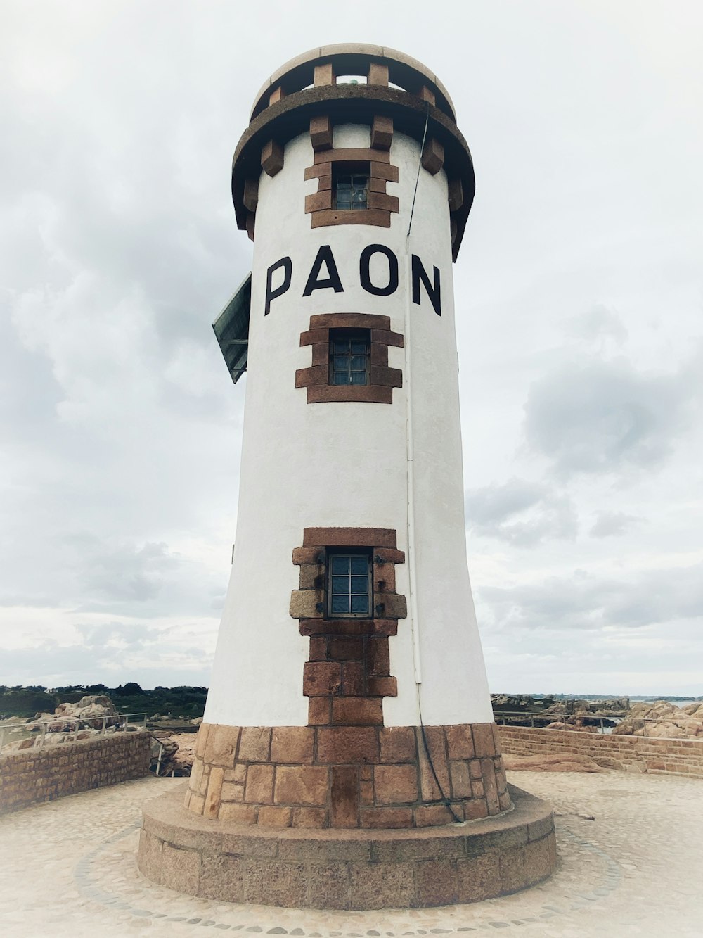 a lighthouse on a beach