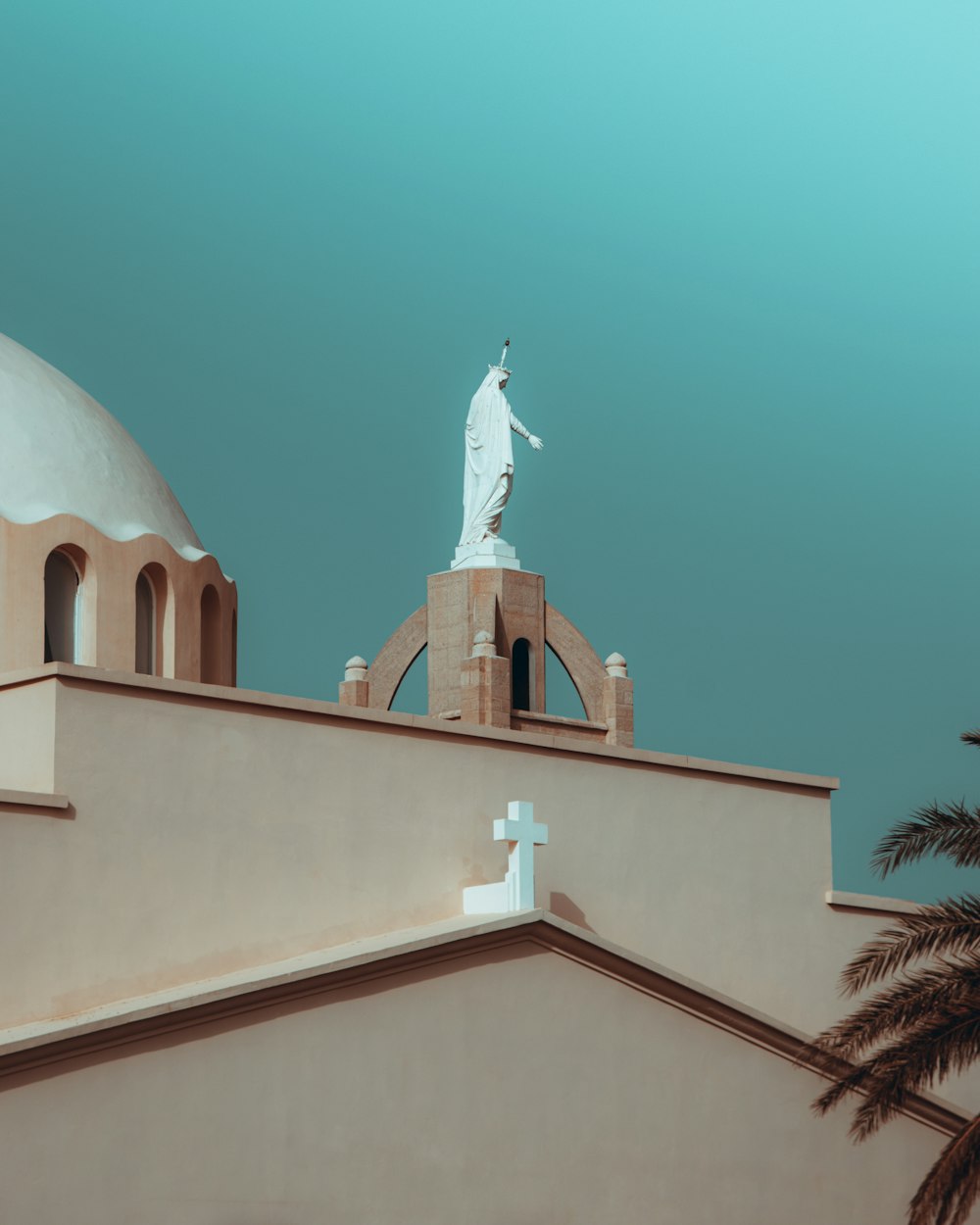 a statue on top of a building