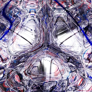 A complex abstract design features swirling patterns and shapes with a blend of lines and textures. The artwork includes a combination of smooth curves and sharp, jagged lines, predominantly in shades of black, white, red, and blue.