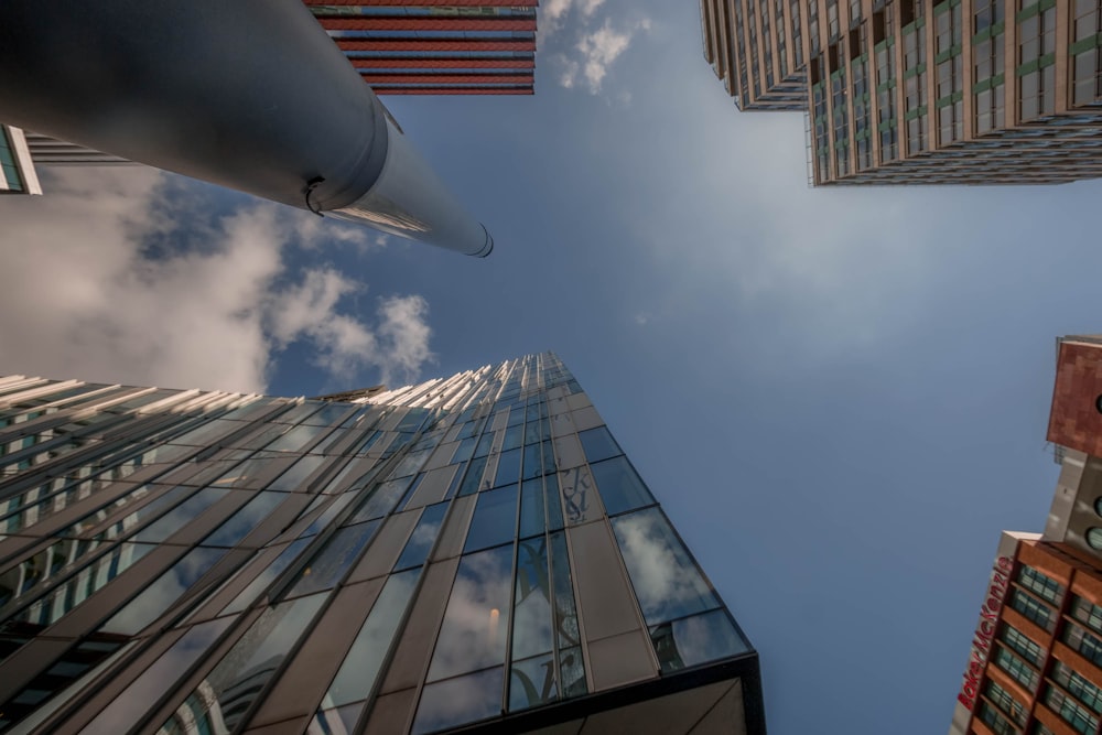 looking up at tall buildings