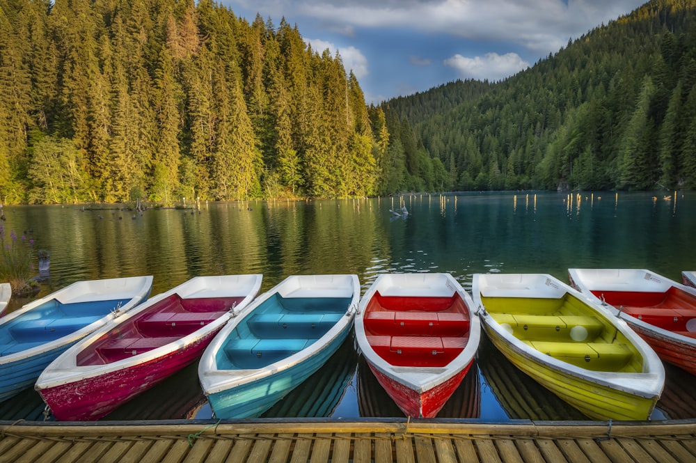 a group of boats on a lake