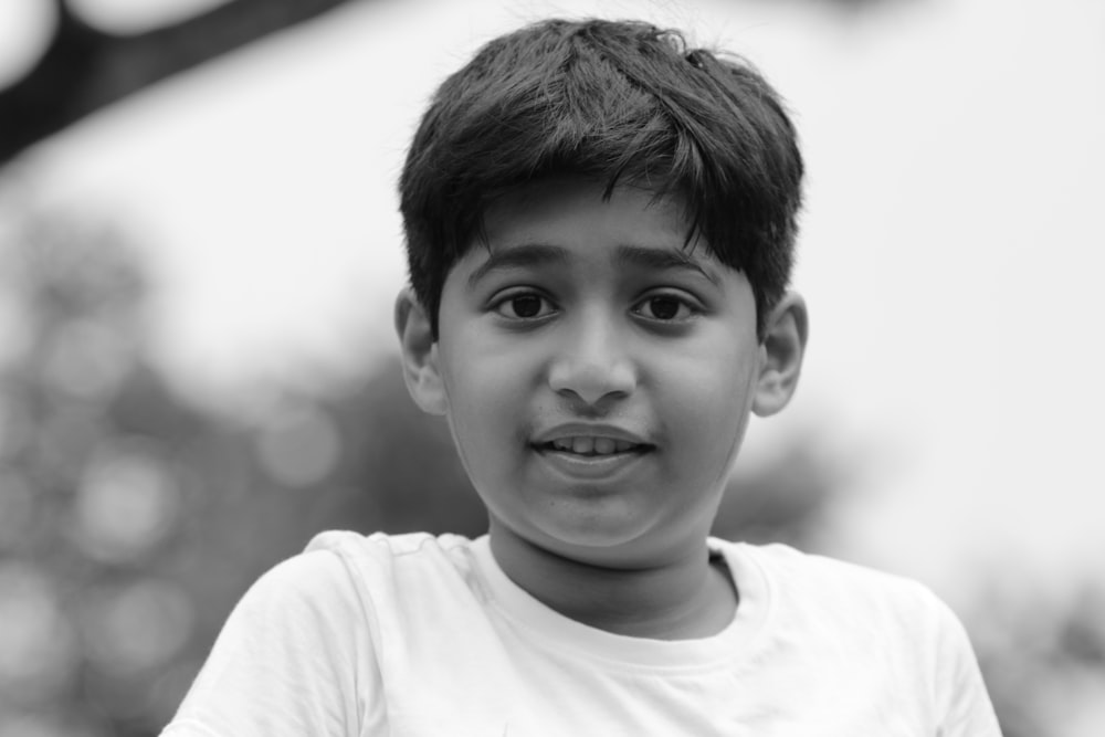 a boy with a white shirt