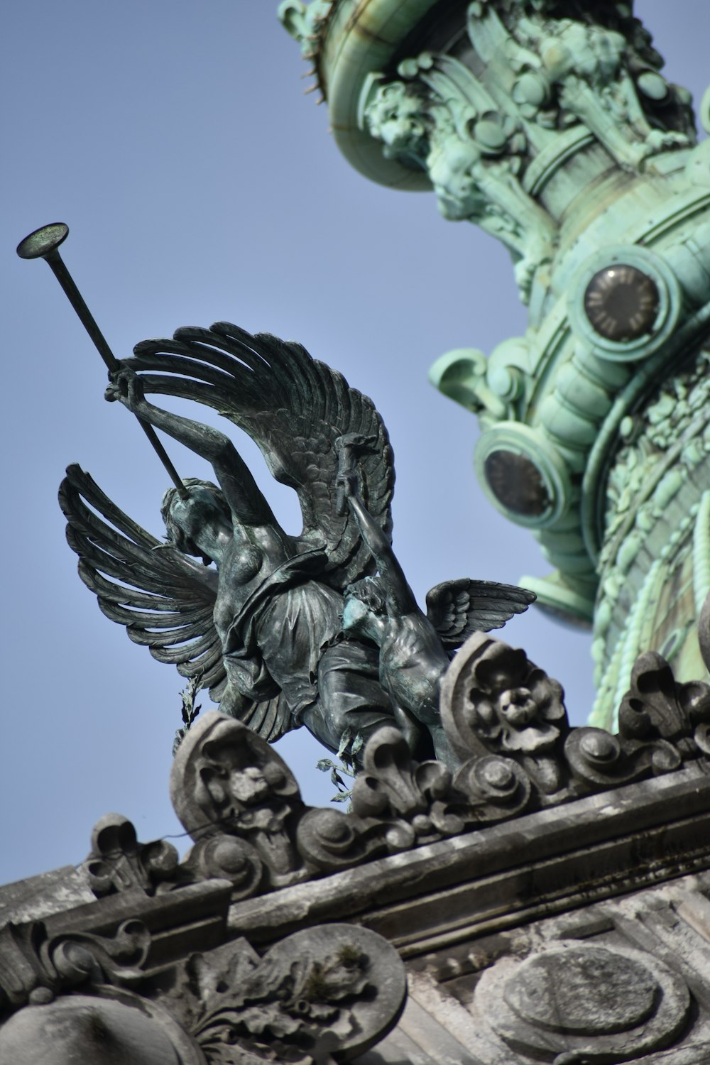 a statue of a person with a sword and a shield