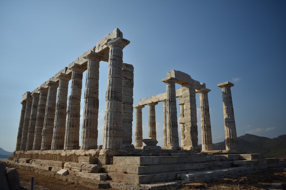 a stone building with pillars