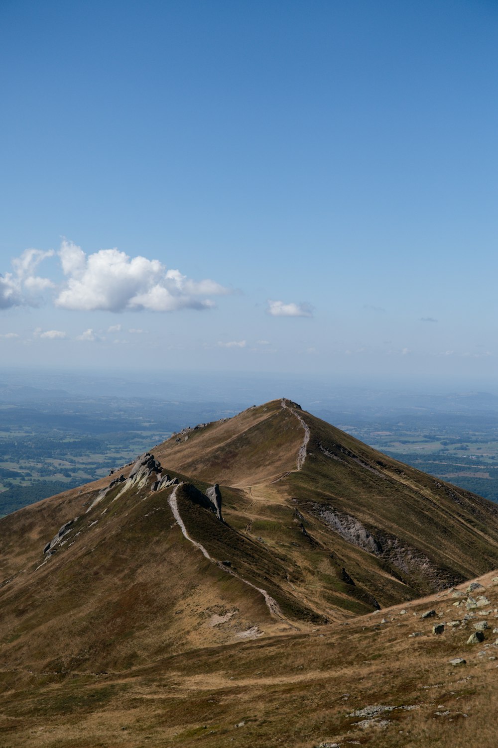 a large mountain with a road