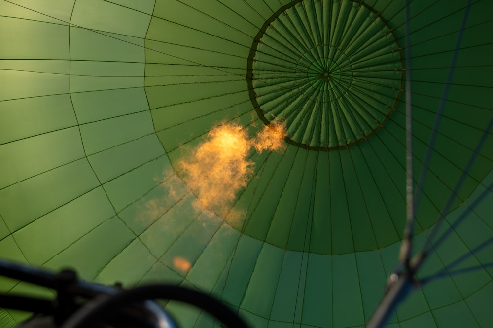 a fire in a green tent