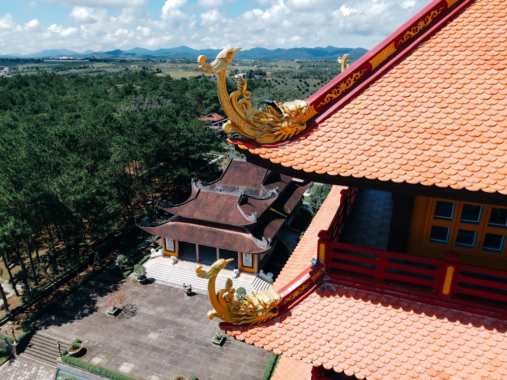 a dragon statue on a roof